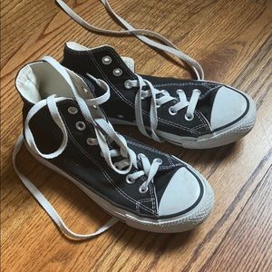 High-Top Black Converse sneakers